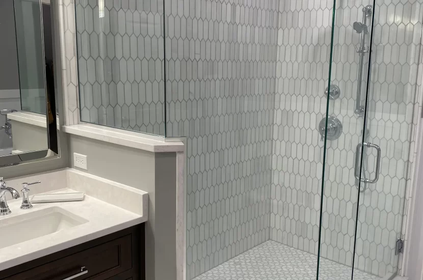 Full bathroom remodel Glen Ellyn with new vanity and modern tile flooring